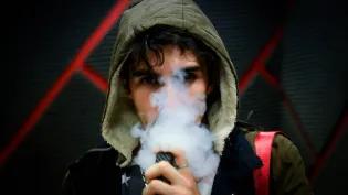 Image of young person vaping