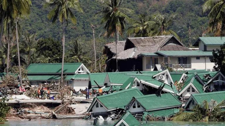 An oceanfront hotel lies collapsed after the December 2004 earthquake and tsunami, pictured near the pier on Kho Phi Phi, Thailand.