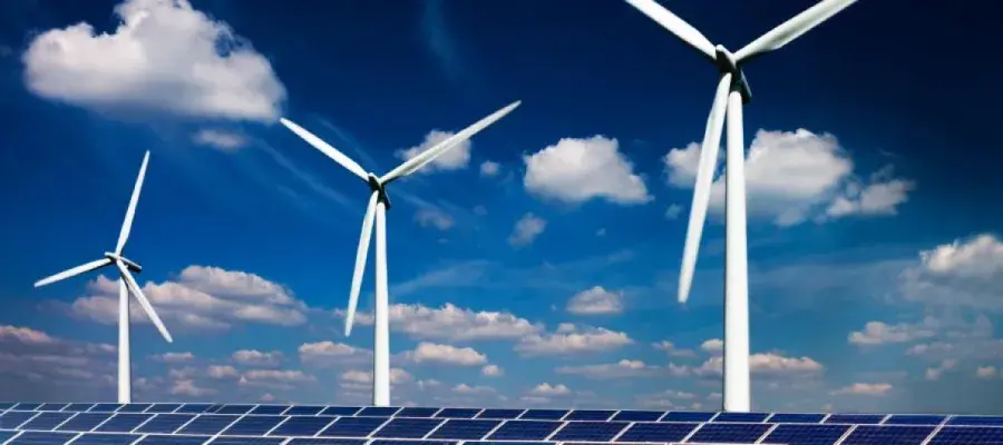 Picture of three wind turbines and solar panels
