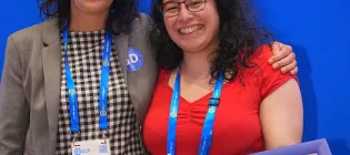Dr Iris van Zelst receiving the EGU Geodynamics Division Outstanding Early Career Scientist Award from Laetitia Le Pourhiet (president of the Geodynamics Division of EGU)