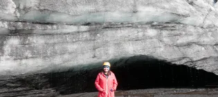 Dr Beatriz Recinos conducting fieldwork on a glacier.
