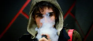 Image of young person vaping