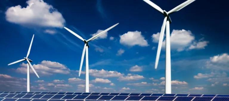 Picture of three wind turbines and solar panels