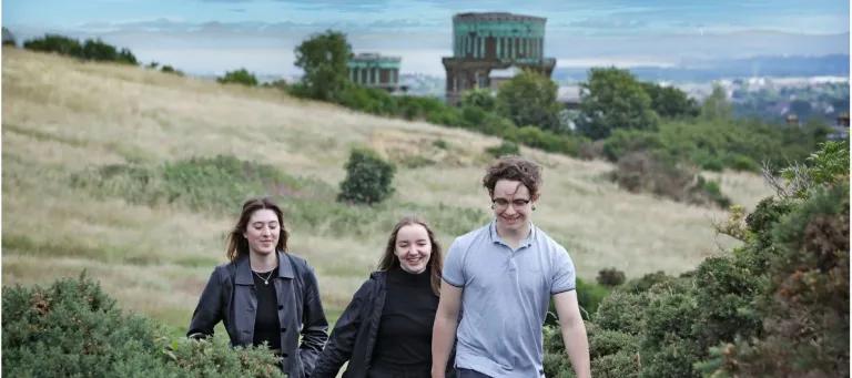 Students walking up Blackford Hill