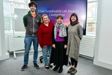 GeoSciences colleagues accepting the silver sustainable lab award