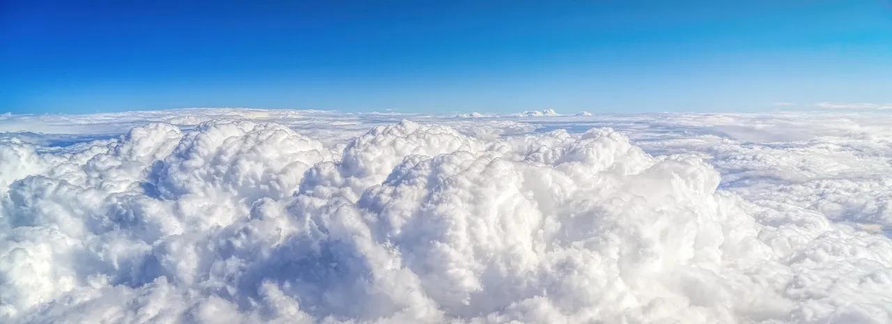 A blue sky filled with clouds