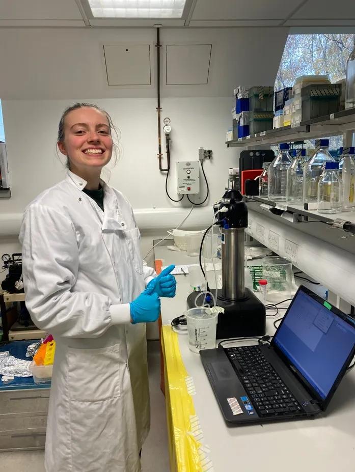 Olivia working in the lab during her disseration