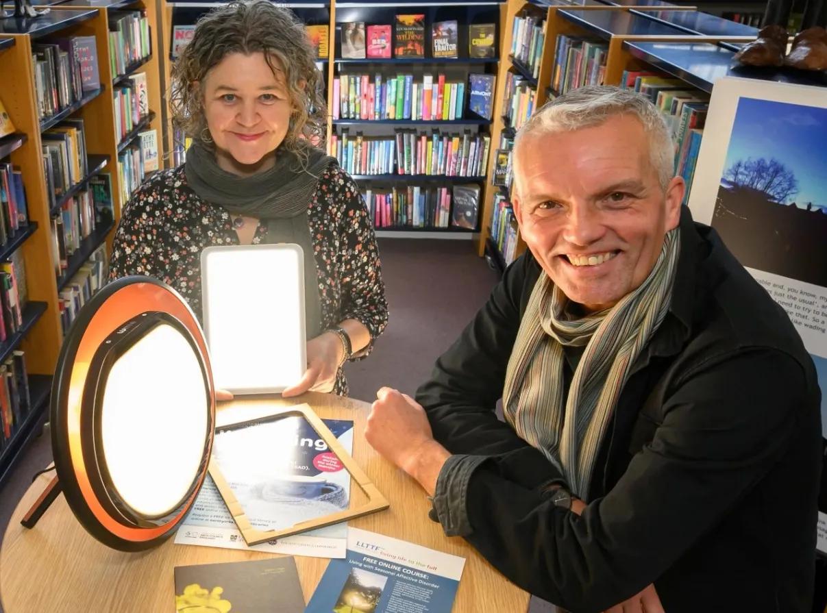 Professor Hester Parr and Professor Hayden Lorimer with the light boxes available to borrow from UK libraries.