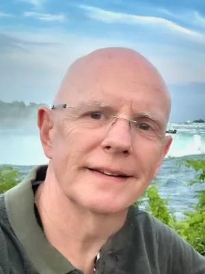 Portrait photo of Wyn smiling at camera