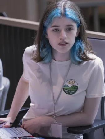 Student volunteer wearing Ecological at 60 event t-shirt